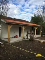Extension de toiture sur une maison pour agrandir l' espace habitable.