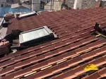 Préparation du chantier pour la couverture d'une toiture en canal gironde.